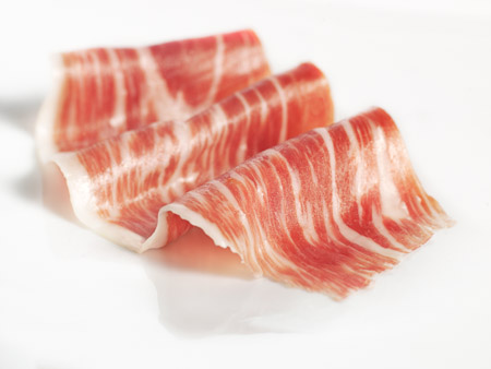 Detalle de la infiltración de grasa en lonchas de jamón ibérico de bellota