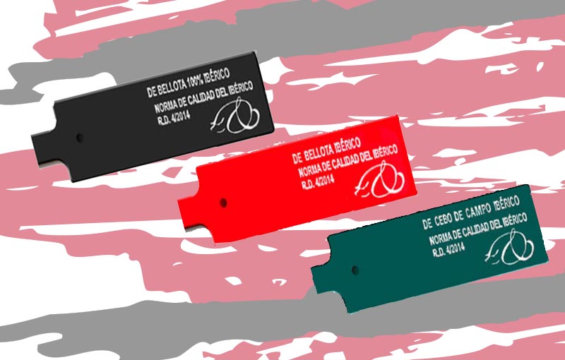 Official colour seals identifying the Ibérico quality categories